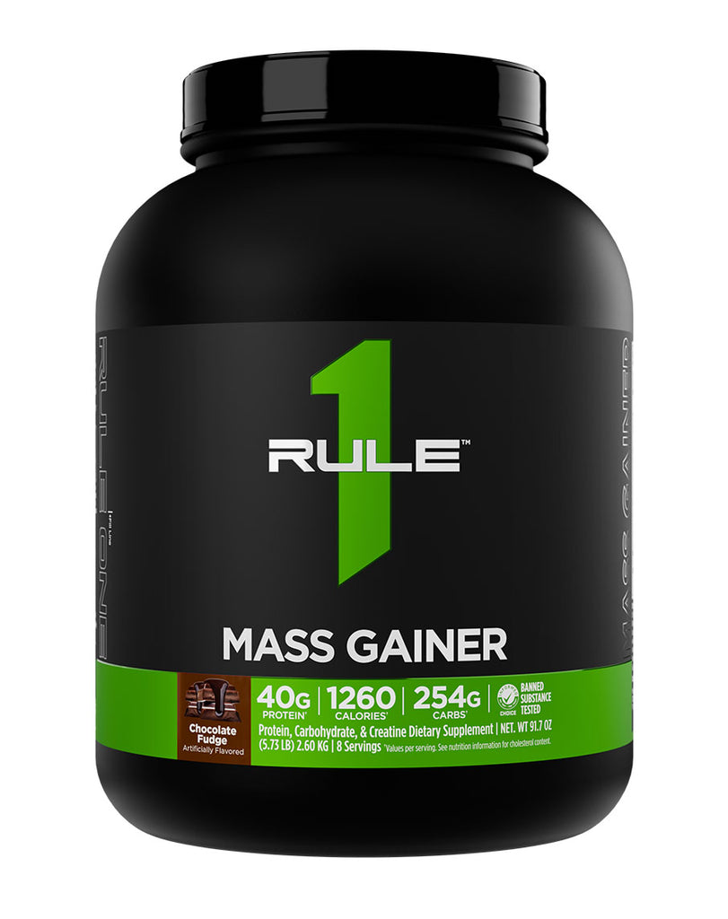 Rule 1 Chocolate Fudge Mass Gainer 2.60kg protein and carbohydrate powder in black container with green label