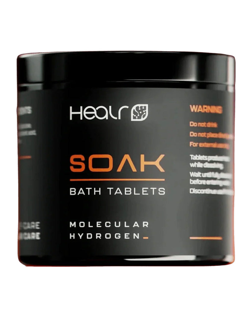 Black container Healr SOAK bath tablets, molecular hydrogen wellness formula with orange label text
